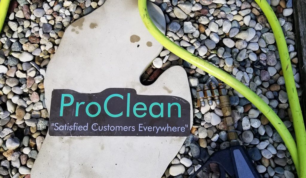 ProClean team pressure washing a Sarasota property